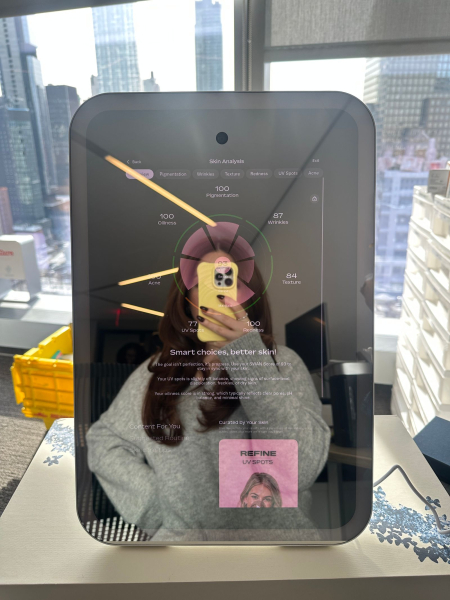 The image contains a photo of Swan Beauty's AIpowered mirror.